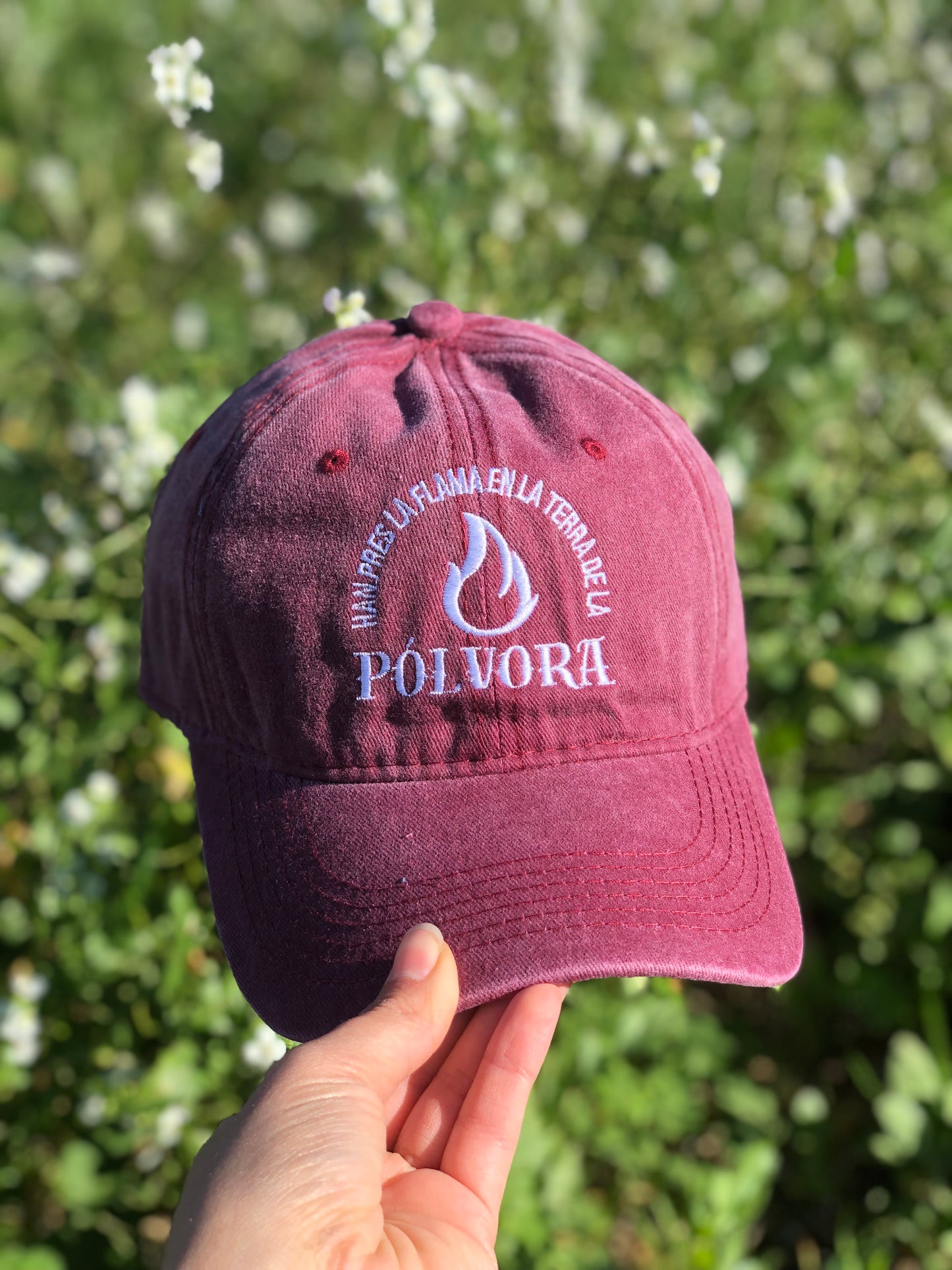 Gorra solidaria "Han pres la flama en la terra de la PÓLVORA"