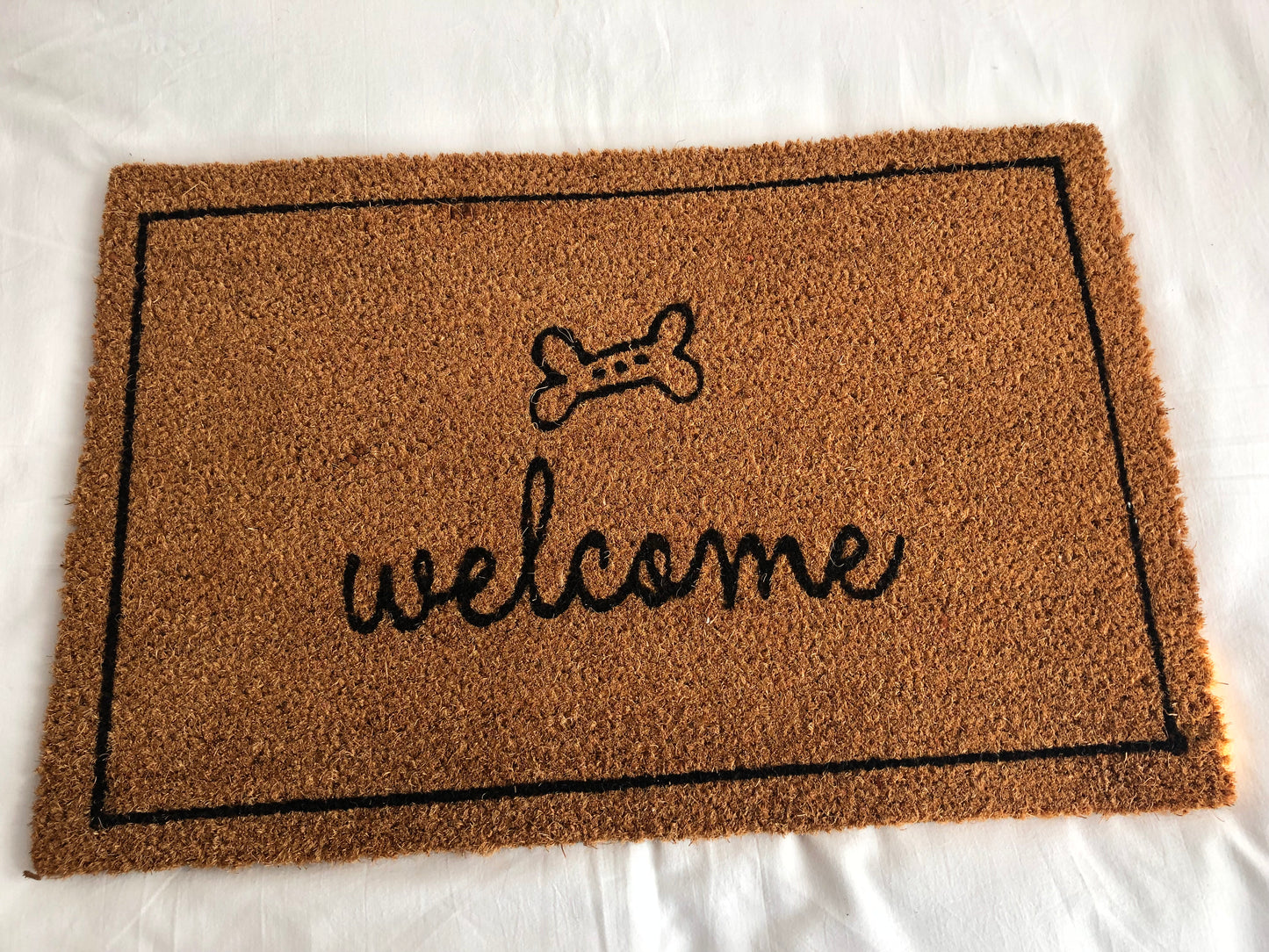 Felpudo “Welcome” con hueso – 40x60 cm