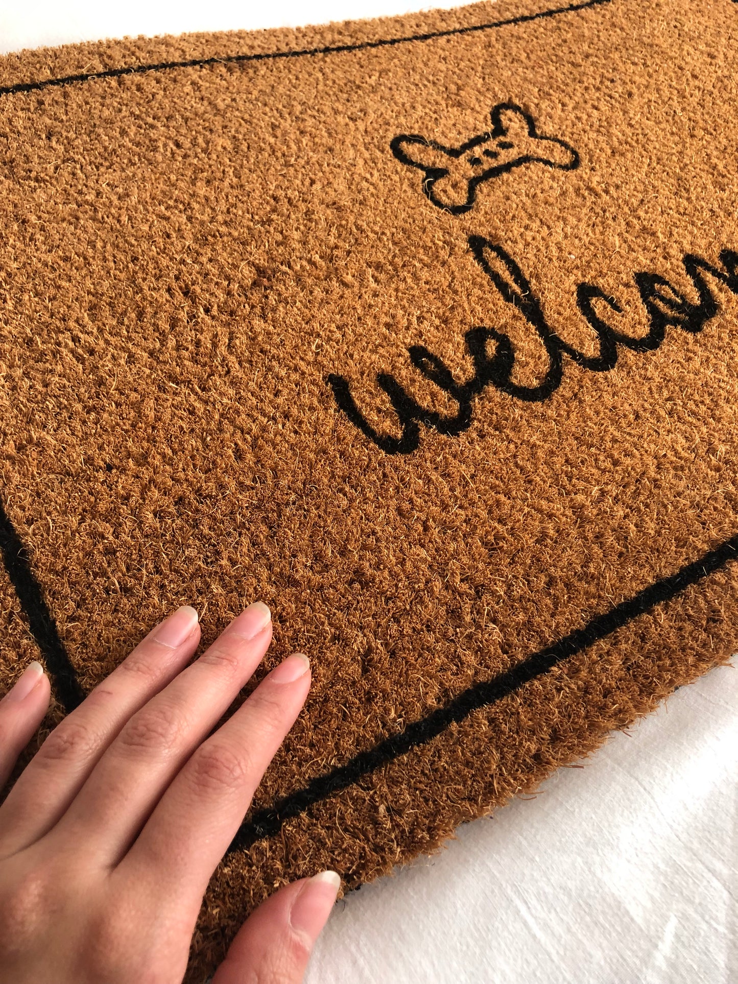 Felpudo “Welcome” con hueso – 40x60 cm